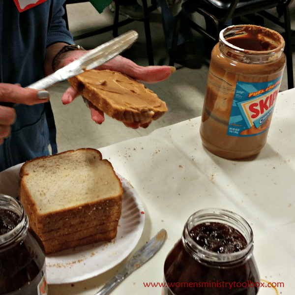 Making peanut butter and jelly sandwiches for Operation Sandwich